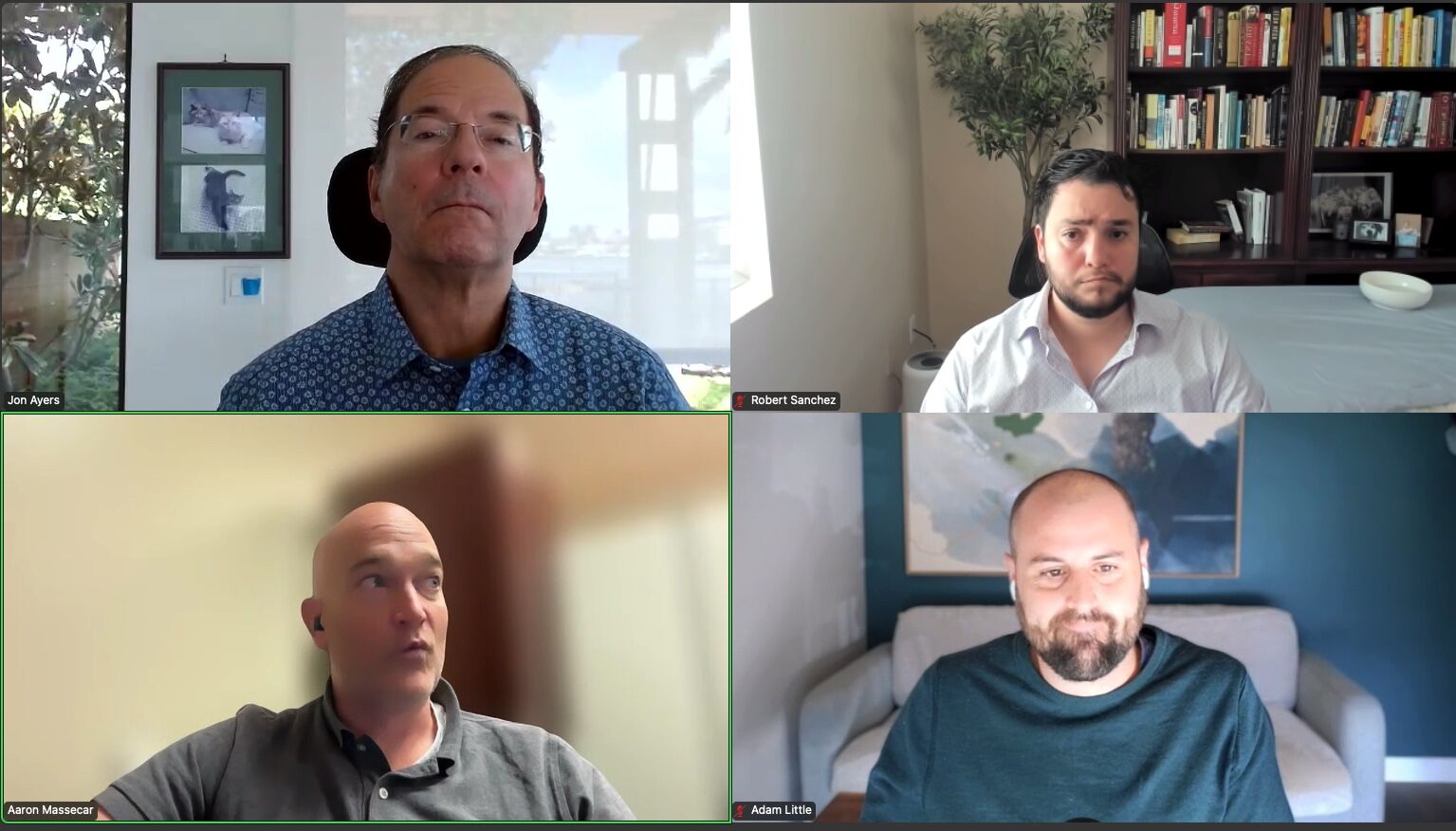 Screenshot of a video call with four men in separate frames, appearing engaged in conversation about artificial intelligence and its applications in veterinary medicine. Two sit in offices with bookshelves, one is by a window, and another is in a room with brown walls.