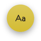 A yellow circle with the black text "Aa" centered inside it, representing a font or text style icon.
